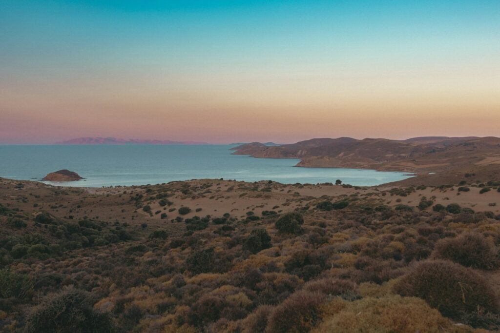 A view of a body of water from a hill